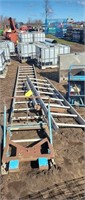 Gas powered shigle lift ladder