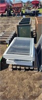 pallet lot of various size vynil windows