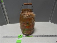 Wooden building blocks in an antique barrel jar