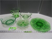 Green glassware; 1 bowl has a crack on the handle