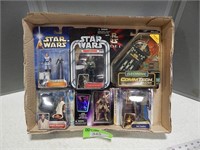 Star Wars action figures and Comm-Tech Reader in o