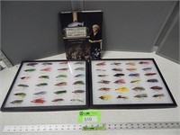 Fishing flies in display boxes and a Fly book
