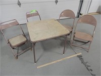 Child's folding table w/4 chairs, chairs don't all