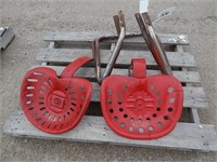 2 Red tractor seats with bases