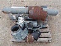 Bundle of various stove pipe pieces and fittings