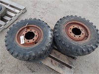 4 Skid loader tires on rims; size: 7.00-15