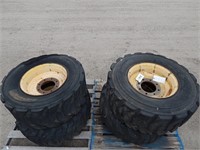 4 Skid loader/Payloader tires on rims; size: 14-17