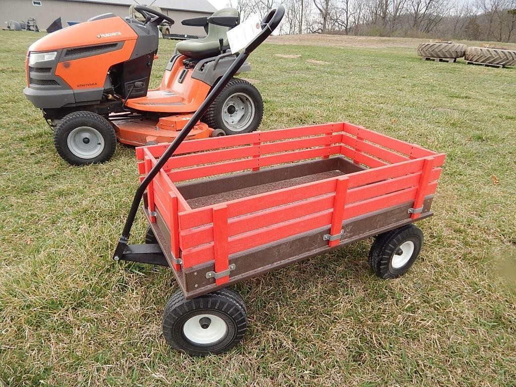 Wagon with poly material bed and racks with steel