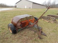 Antique stalk chopper; needs tires; no other infor