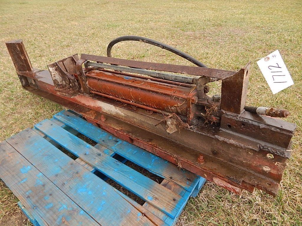 Wood splitter with a small skid steer attachment;