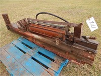 Wood splitter with a small skid steer attachment;