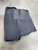 Black floor mat for car (unknown make/model)