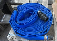 Quantity of 1-1/2" Flat Hose, Unknown Length.