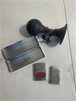 Vintage zippo light and horn lot