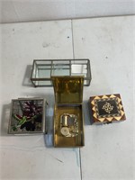 Antique brass music box and glass boxes