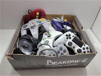 Box of Assorted Video Game Controllers