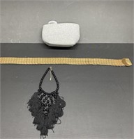 Necklace, belt and makeup bag