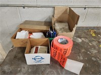 Assorted shipping supplies and inventory tags