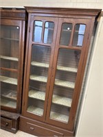 Early bookcase with two glass doors and one