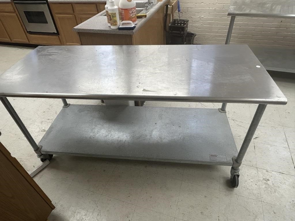 Stainless steel table on wheels 72 inches wide b