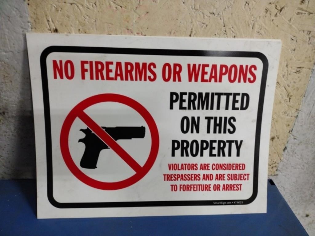 5 plastic no firearms or weapons permitted on