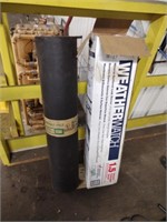 Asphalt felt tar paper roll and approximately 20