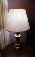 Brass base table lamp w/ pleated fabric shade,