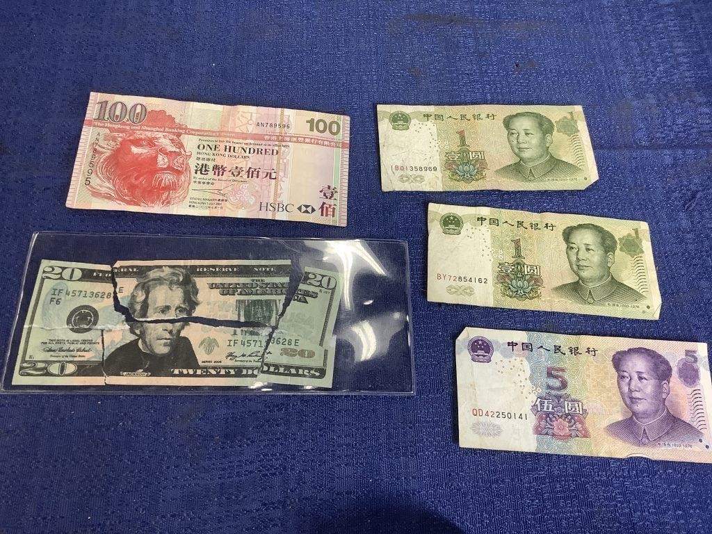 Foreign money.  Torn $20