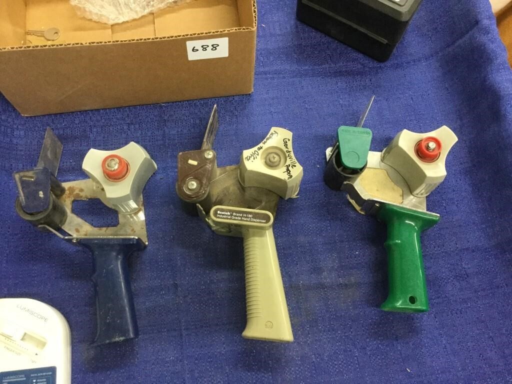 Three industrial grade hand tape dispensers, etc.