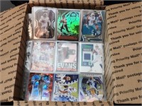 BOX FULL OF SPORTS CARDS IN BINDER SHEETS (550+...