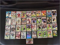 LOT OF ROOKIE NFL FOOTBALL CARDS WITH CAM...