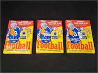 THREE SEALED PACKS OF 1989 TOPPS NFL FOOTBALL...