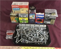 Assortment Of Screws And Bolts, Staples