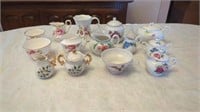 VARIETY OF CERAMIC TEAPOTS  AND CUPS