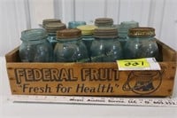 Blue ball jars in wooden Federal fruit box