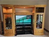 Large, wooden entertainment center w/ built in