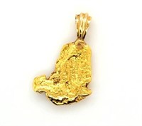 Large Alaskan gold nugget with very solid 24kt bal