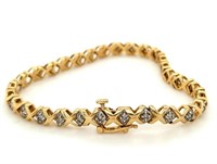 10kt Gold and diamond infinity bracelet, dozens of