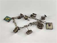 Sterling Silver vintage charm bracelet, includes a