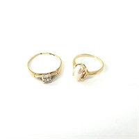Two 14kt gold rings: 1 with pearl 1 with small dia