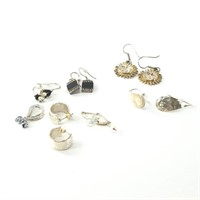 Large lot of sterling silver earrings in different