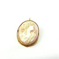 10kt Gold cameo pendant hand carved, with a 14kt g