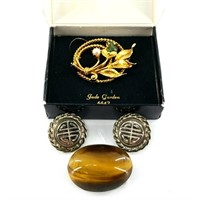 Tiger's eye brooch, jade and gold tone brooch and