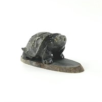 Stone carved tortoise on a base about 3.5" long