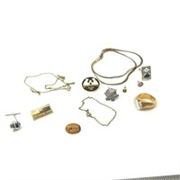 Lot of fashion jewelry including a 14kt gold elect