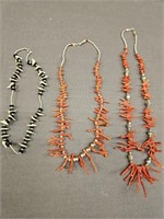 TWO RED BRANCH CORAL NECKLACES, AND ONE BABY