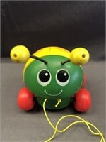 VINTAGE FISHER PRICE PULL ALONG LADY BUG.
