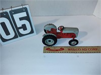Toy Red and gray Ford antique metal tractor.