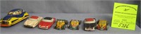 Group of seven vintage all tin vehicles