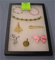 Group of quality pins and bracelets
